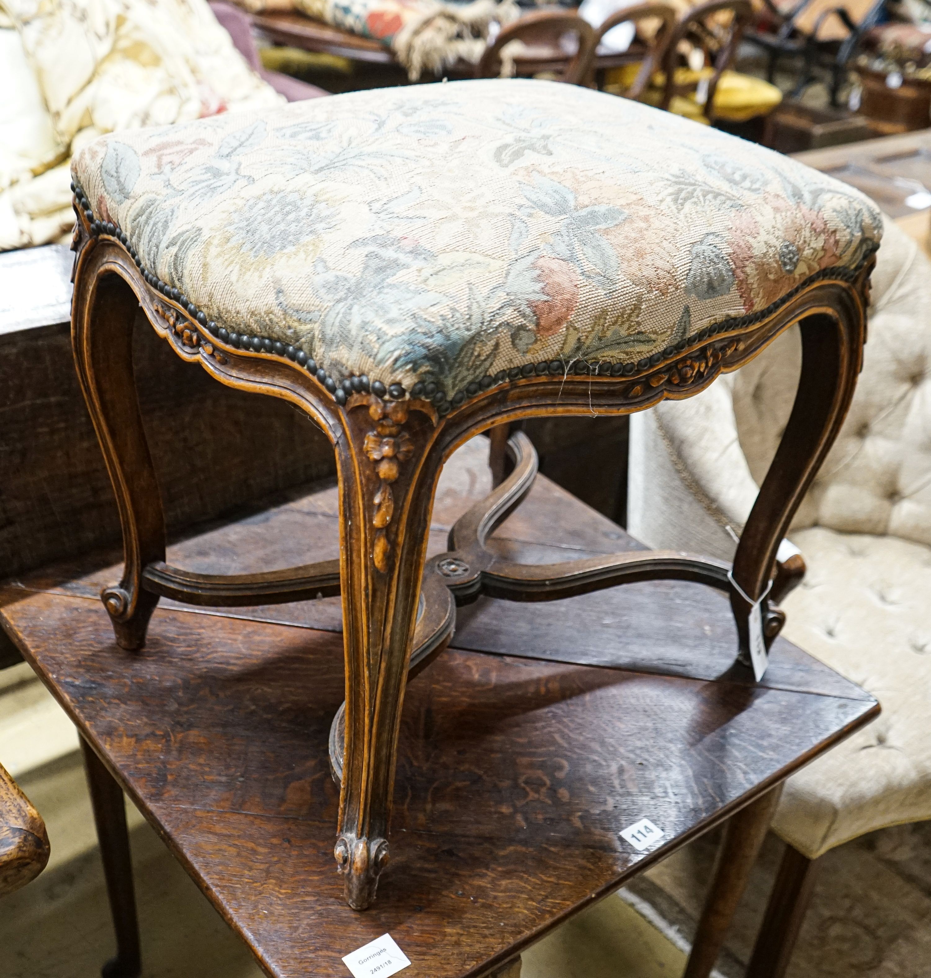 A French stained beech cabriole leg dressing stool with saltire stretcher, width 54cm, depth 41cm, height 51cm